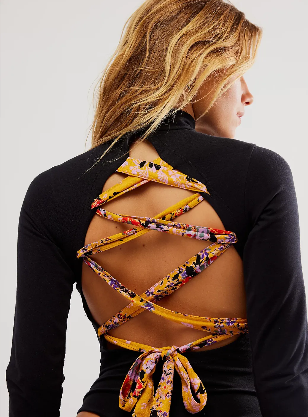 Free People Straps in the back Long Sleeve Bodysuit