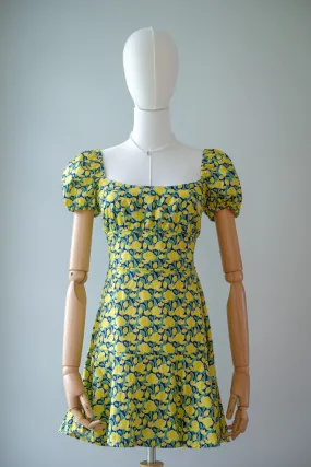 The Suri Mini dress - yellow floral