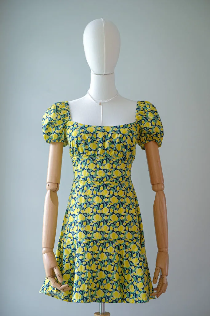 The Suri Mini dress - yellow floral